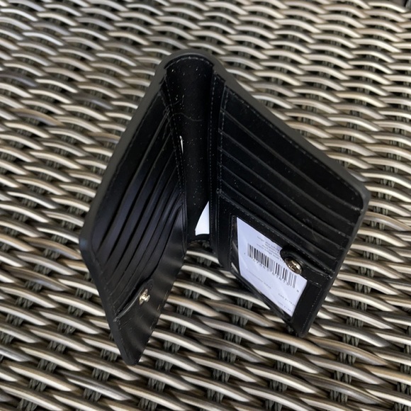 Kate Spade Staci Colorblock Large Slim Bifold Wallet:
saffiano - Picture 7 of 16